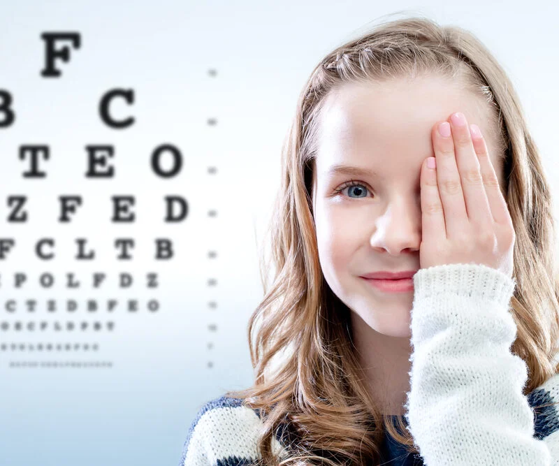 Close up portrait of girl reviewing eyesight - Myopia Management